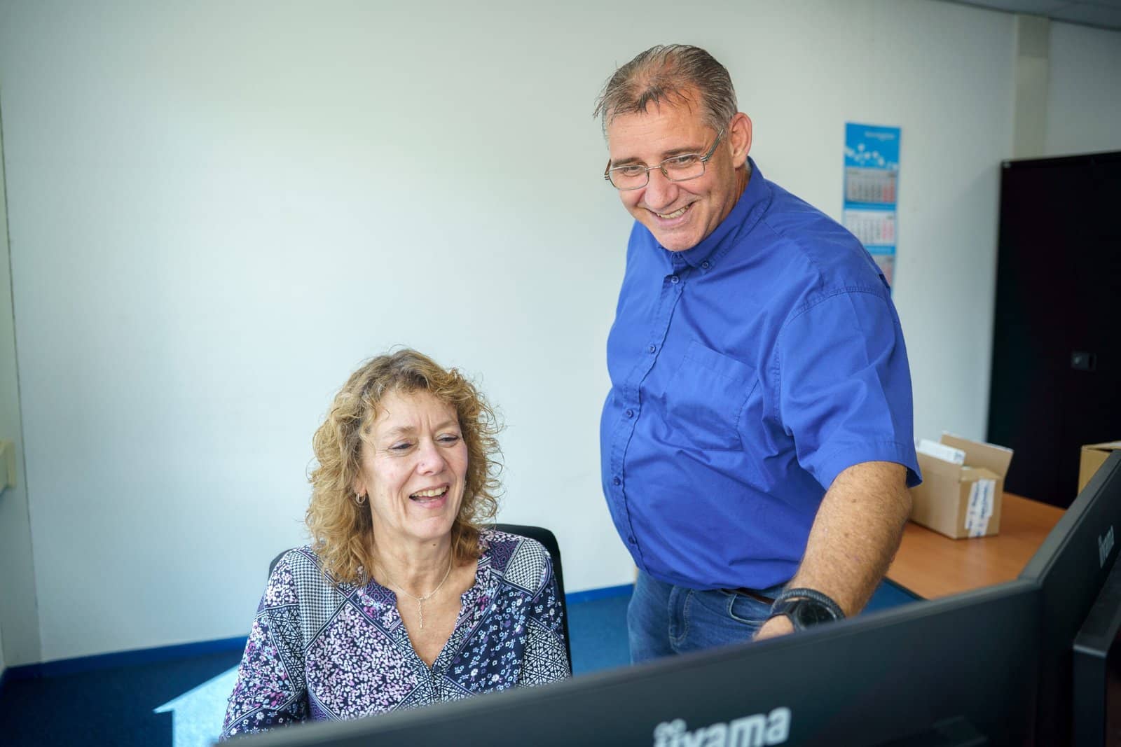 Serviceplanning bij Kurios Service achter de computer